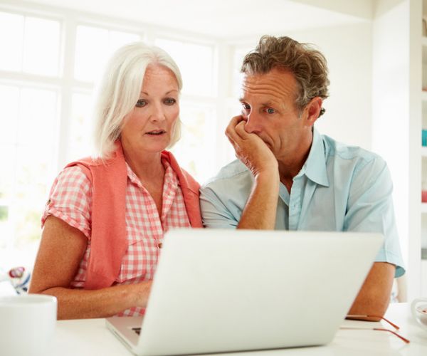 people reading news on computer